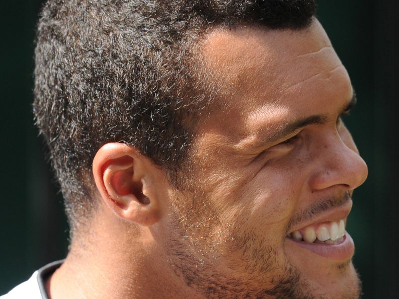 Jo-Wilfried Tsonga stands between Andy Murray and the final
