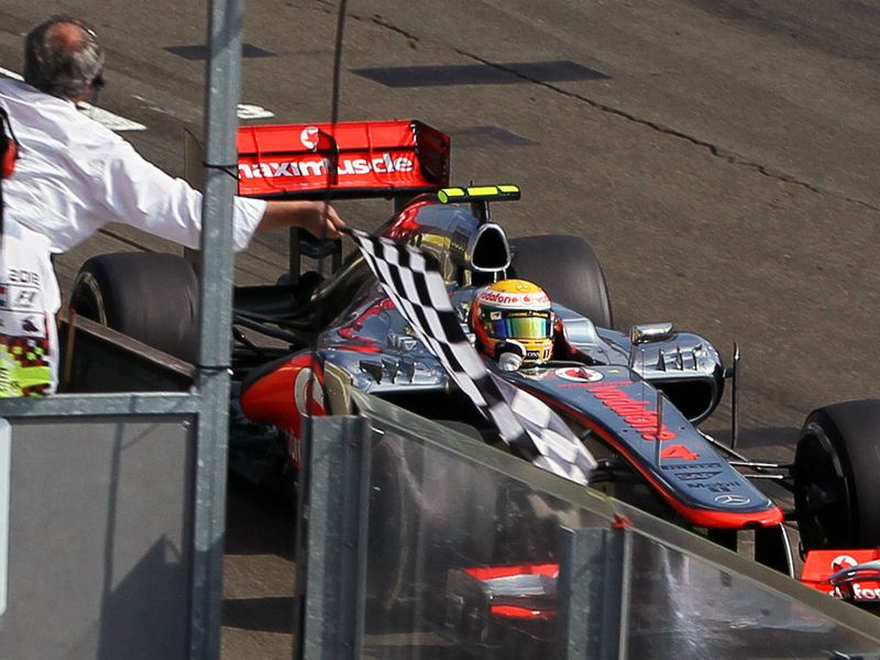 Hamilton takes the cherquered flag