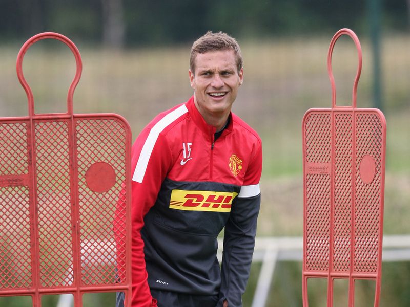 Vidic is closely marked