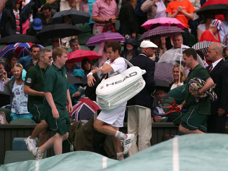It wouldn't be a Wimbledon final without rain, and sure enough the downpour comes with the score at one set all, one game all and Federer 40-0 up.