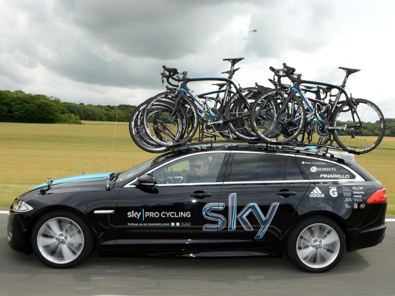 Sean Yates was following the action closely in his new Jaguar Sportsbrake