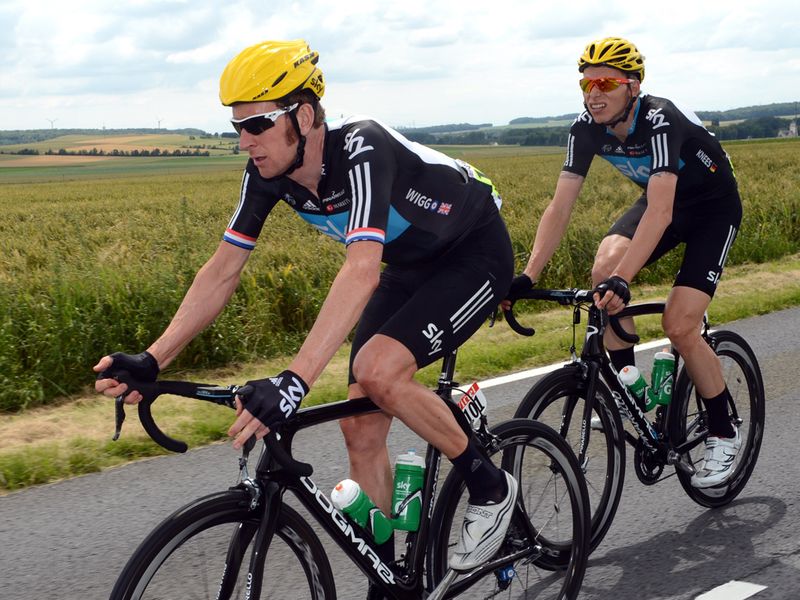 Bradley Wiggins is shadowed by Christian Knees