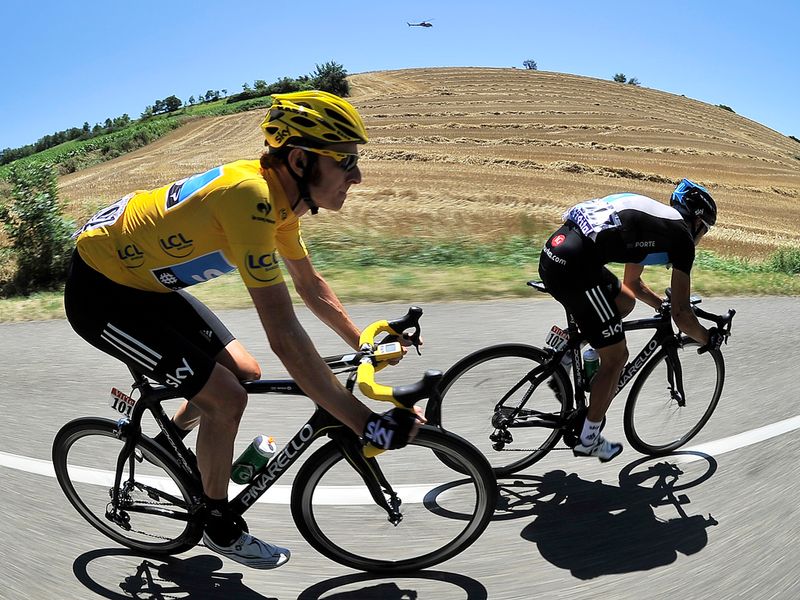 Bradley Wiggins was in yellow for an eighth successive day...