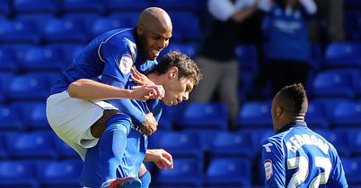 Zigic: Celebrates his dramatic equaliser