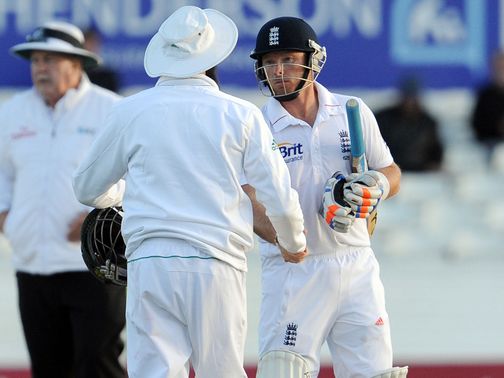 Amla and Bell shake hands at the end of the game