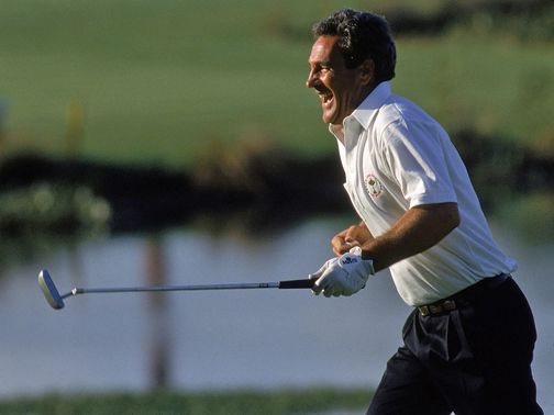 Jose Maria Canizares celebrates the putt that kept the trophy in European hands