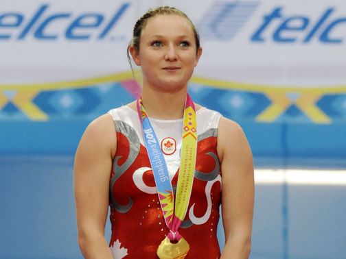 Rosannagh MacLennan: scored 57.305 in the final, 0.575 marks clear of Huang