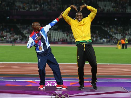 Farah celebrates his moment with sprint king Usain Bolt&nbsp;