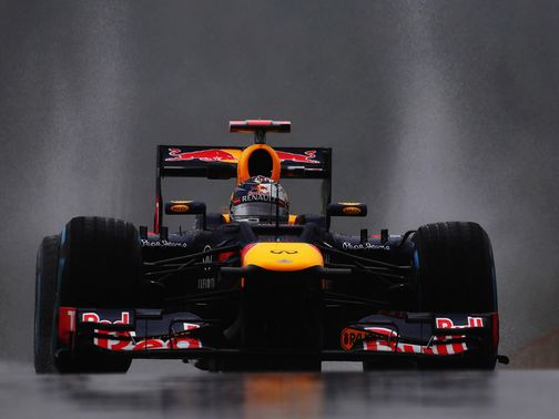 Sebastian Vettel drives in the rain at Spa