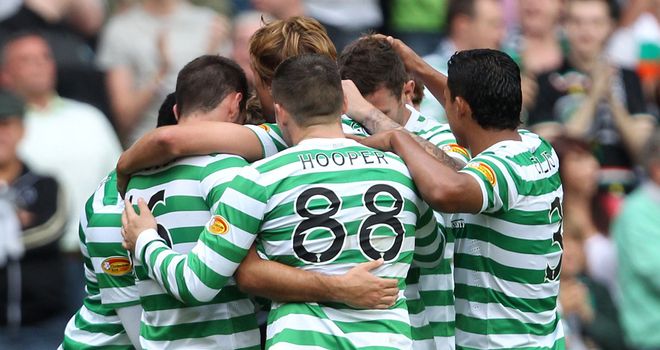 Celtic players celebrate their 1-0 win over Aberdeen