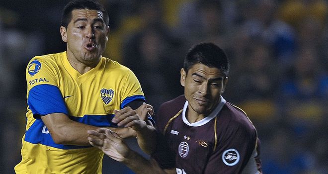 Lanus defender Paolo Goltz (right) is hoping for Betis switch