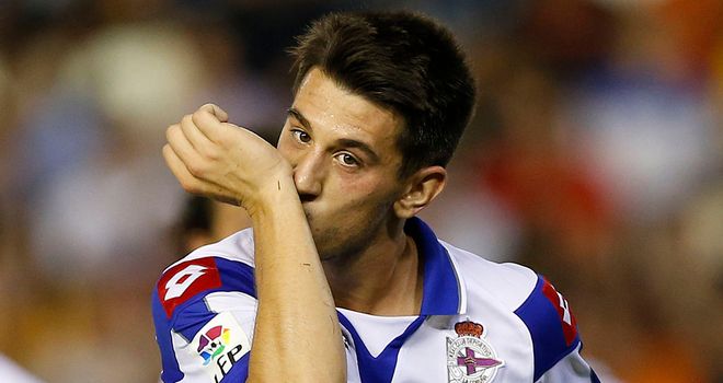 Pizzi celebrates his equaliser from the spot