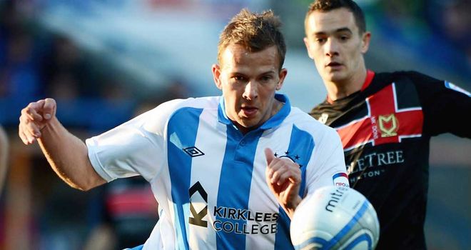 Rhodes: Set for Rovers debut