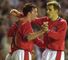 Robbie Fowler enjoys a rare outing in an England shirt