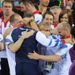 Hoy shares his victory with the Team GB staff...