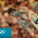 Australia's Matthew Mitcham comes dangerously close to the platform as he performs an inward somersault
