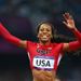 Sanya Richards-Ross crosses the finish line in the final Women's 4x400m Relay to confirm an easy win and a Gold medal for Team USA