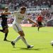 Angel Rangel slots home the opening goal for Swansea.
