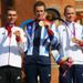Wiggins flanked by silver medallist Tony Martin with Team GB's Chris Froome claiming bronze.
