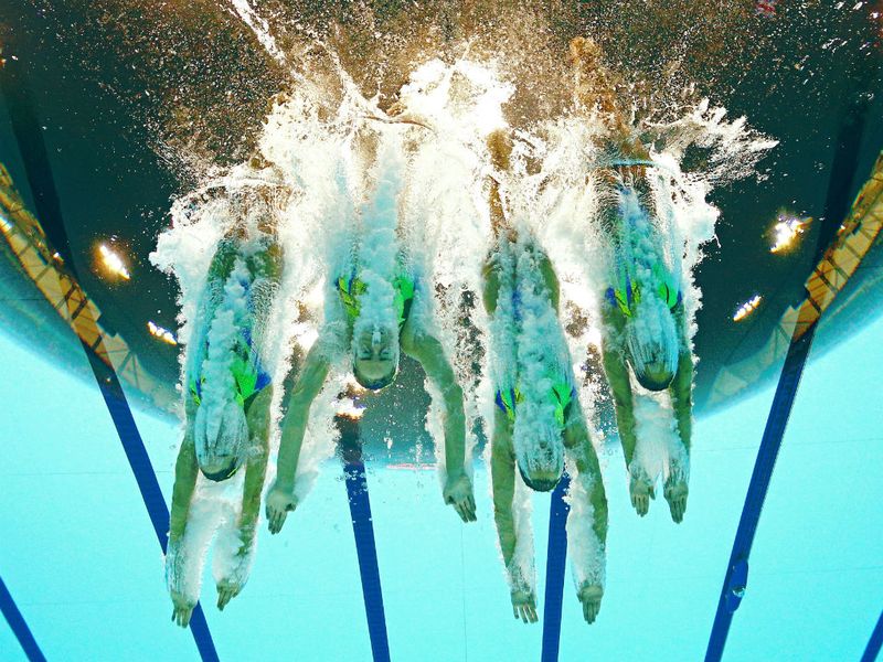 The British women compete in the teams synchronised swimming free routine final.