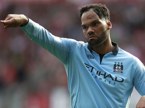 Joleon Lescott: Happy to stay at Manchester City