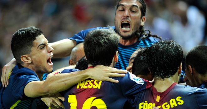 Barcelona celebrate their winner.