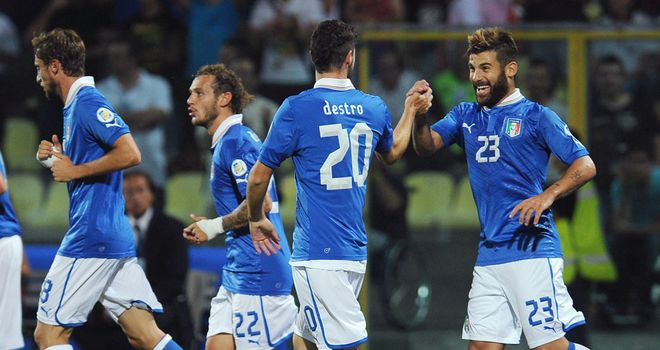 Italy celebrate victory in Modena.