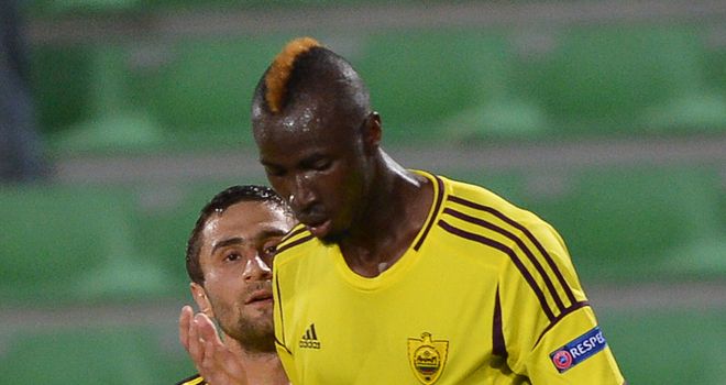 Lacina Traore celebrates his goal for Anzhi