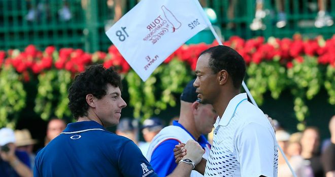 Tiger Woods (R) has enjoyed the opportunity to play with Rory McIlroy (L) on a regular basis recently