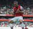 Lukas Podolski celebrates his first goal at the Emirates Stadium