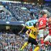 Joleon Lescott heads Manchester City in the lead
