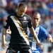 Dimitar Berbatov holds off Ivan Ramis as Fulham visit Wigan