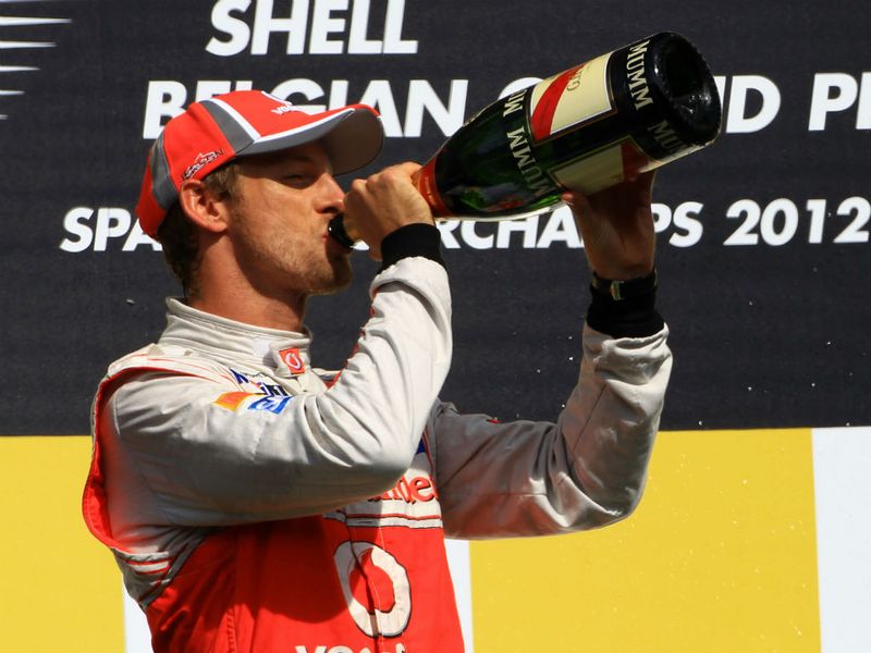 The winner sips his champagne