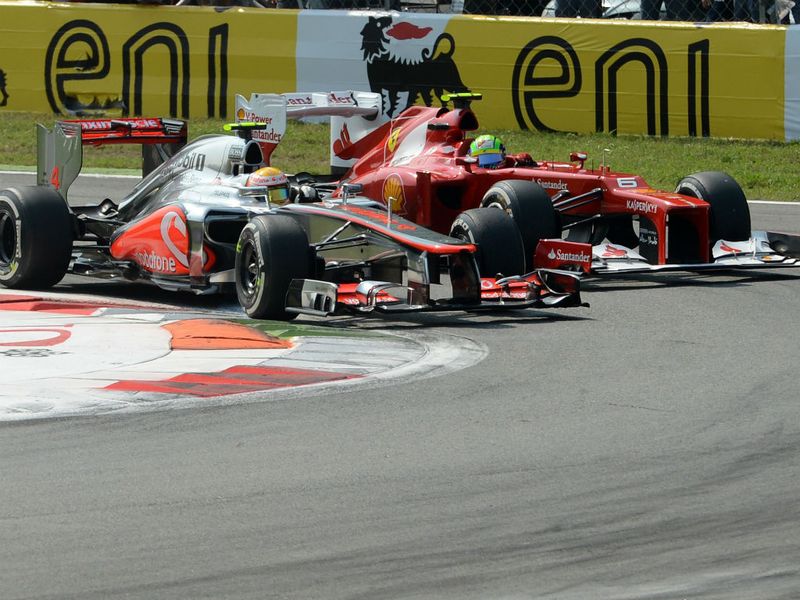Hamilton and Massa battle at the first turn