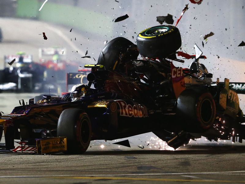 Michael Schumacher crashes into the back of Jean-Eric Vergne's Toro Rosso
