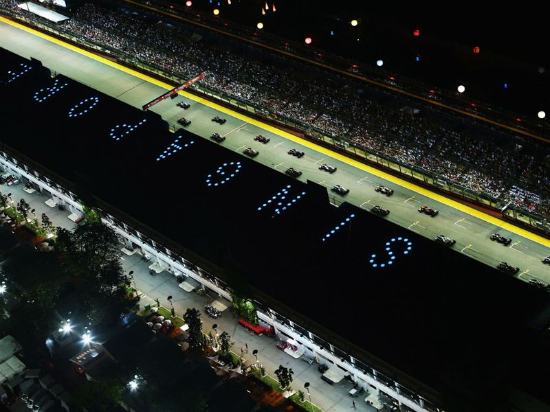 The cars get ready for the night race