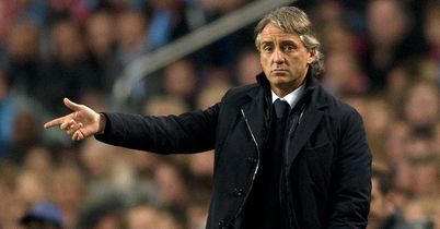 Roberto Mancini: Unconcerned over speculation linking Guardiola with City job