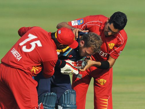 David Miller comes off worst after a short ball