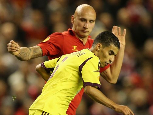Mbark Boussoufa competes with Jonjo Shelvey