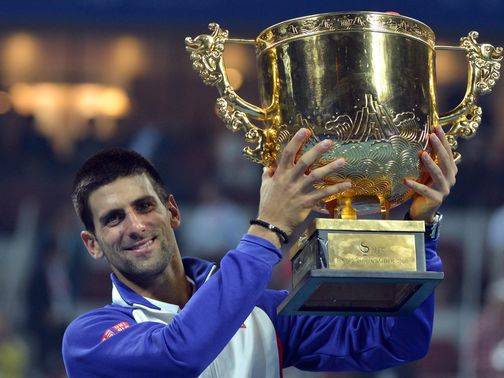 Novak Djokovic with the spoils of victory