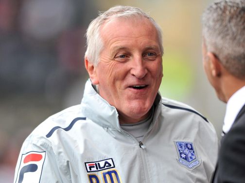 Ronnie Moore: His side's clash with Braintree has been postponed