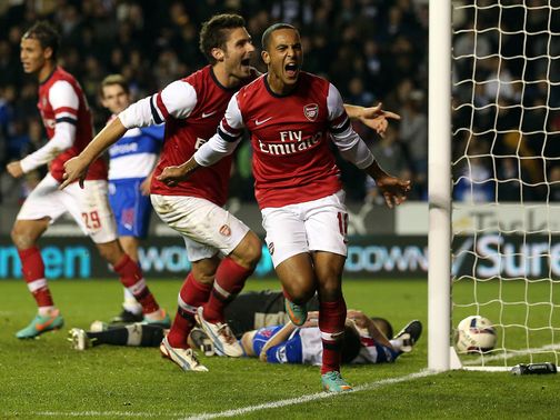 Arsenal celebrate during their incredible win at Reading
