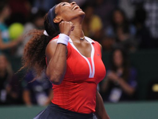 Serena Williams celebrates her victory over Maria Sharapova