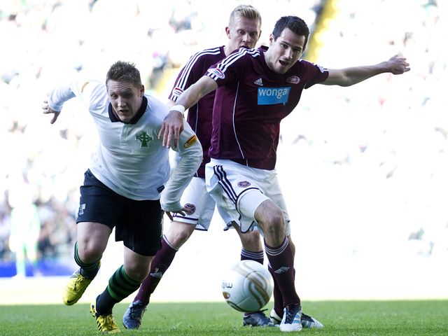 Commons and McGowan battle for the ball.