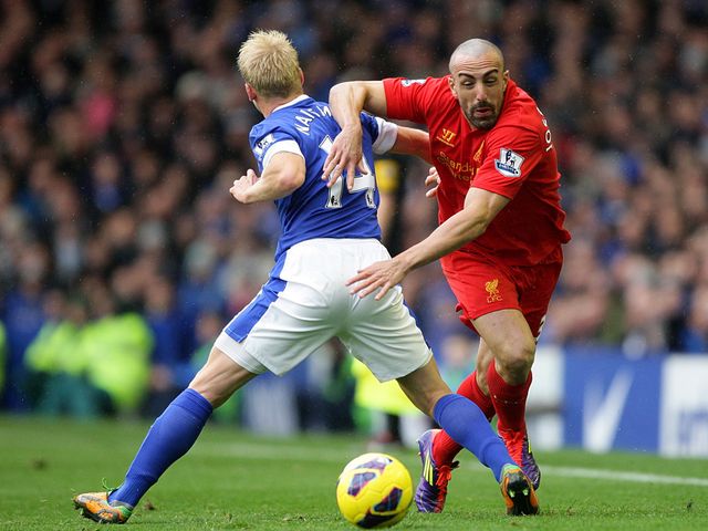 Steven Naismith can't stop Jose Enrique.