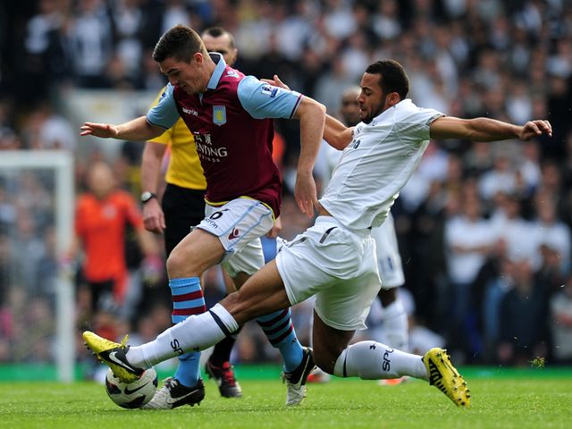 Dembele tries to win possession from Clark.