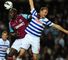 QPR's Clint Hill is beaten to the ball