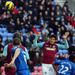 James Tomkins scored a late goal but it wasn't enough to stop Wigan claiming victory.