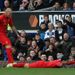 Suarez celebrated the opening goal by diving in front of David Moyes following pre-match comments by the Everton manager