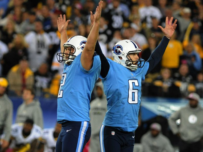 Rob Bironas celebrates kicking the winning field goal for Tennessee Titans against Pittsburgh Steelers.